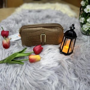 The Croc-Embossed Gold Accent Clutch